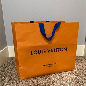 Louis Vuitton Bold Orange Bag with Blue Handles